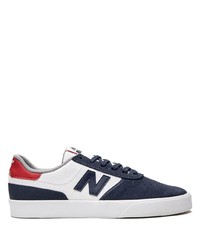Sneakers basse in pelle bianche e blu scuro di New Balance