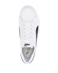 Sneakers basse in pelle bianche e nere di Puma