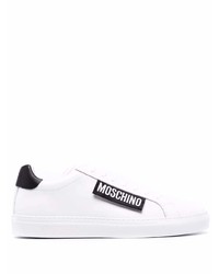 Sneakers basse in pelle bianche e nere di Moschino