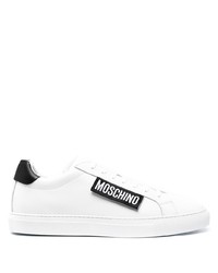Sneakers basse in pelle bianche e nere di Moschino