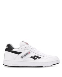 Sneakers basse in pelle bianche e nere di Reebok