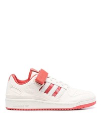 Sneakers basse in pelle bianche e rosse di adidas