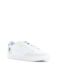 Sneakers basse in pelle bianche e verdi di Puma