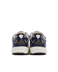 Sneakers basse in pelle blu scuro e bianche di adidas Originals