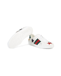 Sneakers basse in pelle con stelle bianche di Gucci