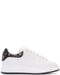 Sneakers basse in pelle decorate bianche