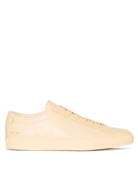 Sneakers basse in pelle dorate di Common Projects
