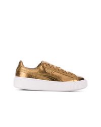 Sneakers basse in pelle dorate di Puma