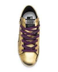 Sneakers basse in pelle dorate di Golden Goose Deluxe Brand