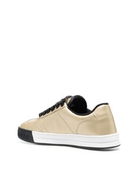 Sneakers basse in pelle dorate di VERSACE JEANS COUTURE