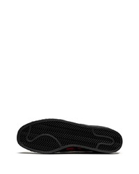 Sneakers basse in pelle mimetiche nere di adidas