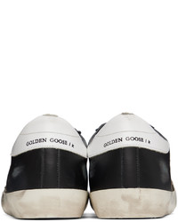 Sneakers basse in pelle nere e bianche di Golden Goose
