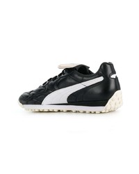 Sneakers basse in pelle nere e bianche di Puma