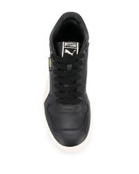 Sneakers basse in pelle nere e bianche di Puma
