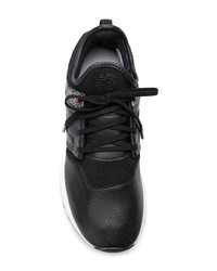 Sneakers basse in pelle nere e bianche di New Balance