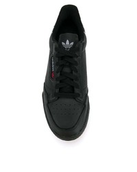 Sneakers basse in pelle nere di adidas