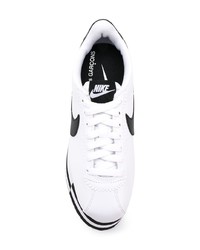 Sneakers basse in pelle pesanti bianche e nere di Comme des Garcons