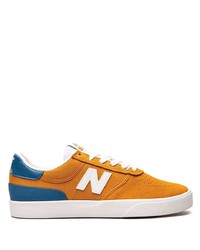 Sneakers basse in pelle scamosciata arancioni di New Balance