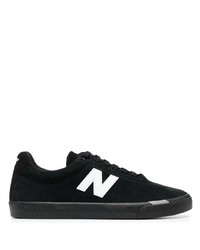 Sneakers basse in pelle scamosciata nere e bianche di New Balance