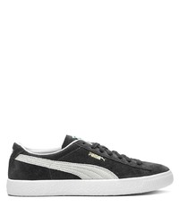 Sneakers basse in pelle scamosciata nere e bianche di Puma