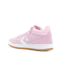 Sneakers basse in pelle scamosciata rosa di Converse