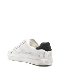 Sneakers basse in pelle stampate bianche e nere di Palm Angels