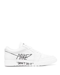 Sneakers basse in pelle stampate bianche e nere di MIKE