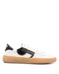 Sneakers basse in pelle stampate bianche e nere di Puraai