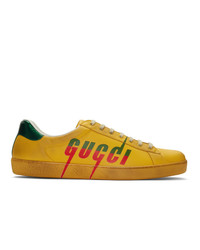 Sneakers basse in pelle stampate gialle di Gucci