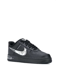 Sneakers basse in pelle stampate nere e bianche di Nike