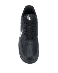 Sneakers basse in pelle stampate nere e bianche di Nike