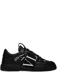 Sneakers basse in pelle stampate nere e bianche di Valentino Garavani