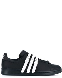 Sneakers basse nere e bianche di Adidas By Raf Simons
