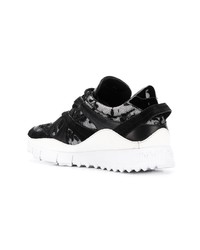 Sneakers basse nere e bianche di Jimmy Choo