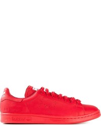 Sneakers basse rosse di Adidas By Raf Simons
