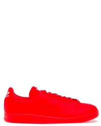Sneakers basse rosse di Raf Simons