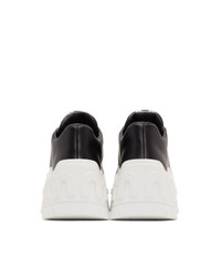 Sneakers con zeppa in pelle nere di Miu Miu