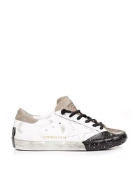 Sneakers in pelle bianche e nere