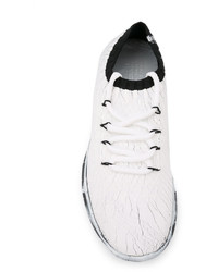 Sneakers in pelle bianche di Maison Margiela