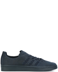 Sneakers in pelle blu scuro di adidas