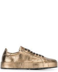 Sneakers in pelle dorate di Jil Sander