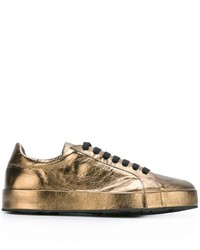 Sneakers in pelle dorate di Jil Sander