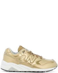 Sneakers in pelle dorate di New Balance