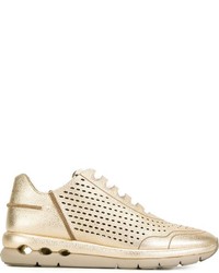 Sneakers in pelle dorate di Salvatore Ferragamo