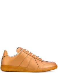 Sneakers in pelle geometriche dorate di Maison Margiela