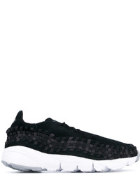 Sneakers in pelle tessute nere di Nike