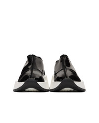 Sneakers senza lacci pesanti nere e bianche di MM6 MAISON MARGIELA