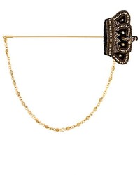 Spilla dorata di Dolce & Gabbana