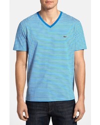 T-shirt con scollo a v a righe orizzontali bianca e blu