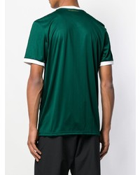 T-shirt con scollo a v stampata verde scuro di adidas